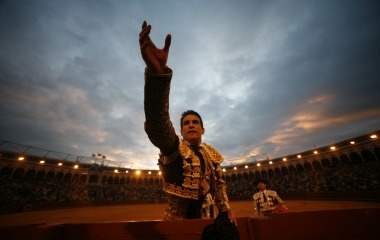 Spanish matador Manzanares celebrates during a bullfight in Seville