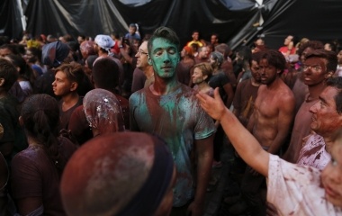 Revellers covered in paint take part in the annual Cascamorras festival in Guadix, southern Spain