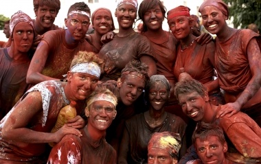 Revellers covered in paint pose during the annual 'Cascamorras' festival in Guadix, southern Spain