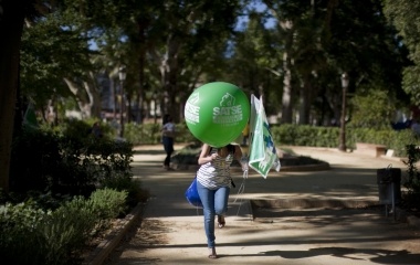 A public sector worker takes part in a demonstration against the cuts of their salaries imposed by the Andalusian Regional Government in Seville