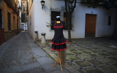 A souvenir apron is shown to be sell next to souvenir shop in the Andalusian capital of Seville