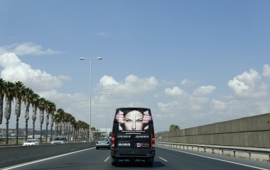 A van of cosmetics is pictured as it is driven along a ring road in the Andalusian capital of Seville, southern Spain