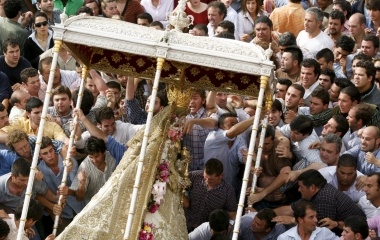 The Statue of Virgin of El Rocio falls over pilgrims in Almonte southwest Spain