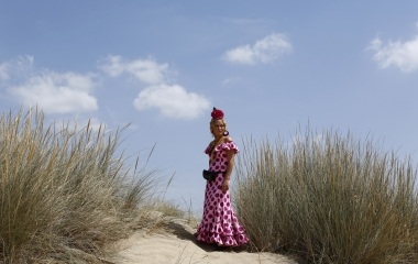 Pilgrim, Maria Raposo, 18, poses for a portrait on her way to the shrine of El Rocio in Donana National Park, southern Spain