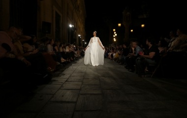A model presents a creation by Maria Jose Suarez in the Andalusian capital of Seville, southern Spain