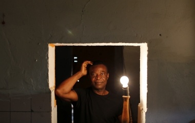 Howard Jackson, 36, a Liberian migrant poses for a portrait at his home in the Andalusian capital of Seville, southern Spain