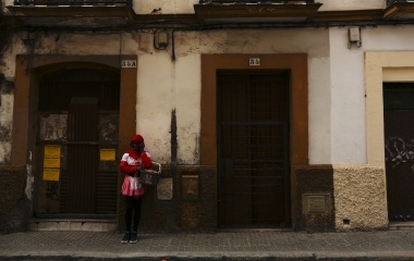 Howard Jackson, 36, a Liberian migrant talks on mobile phone in the Andalusian capital of Seville, southern Spain
