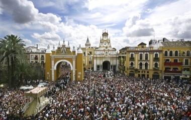 Thousands people mass to watch the entrance of the Virgin of La Macarena into the Macarena's basilica during Holy Week in the Andalusian capital Seville
