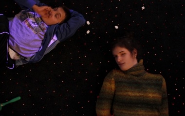 Deaf-blinds Ines, 22, and Juan Antonio, 17, lie on a carpet in Santa Angela de la Cruz centre in Salteras, near Seville