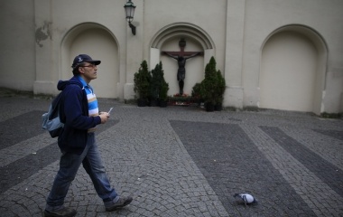 Jose Manuel Abel, 47, walks after finishing his work day in Munich