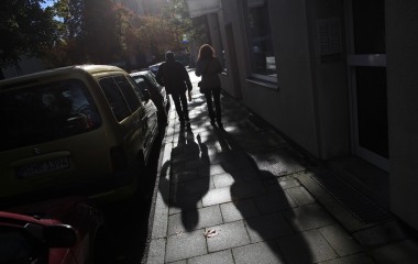 Jose Manuel Abel, 47, and his wife Oliva, 47, walk in the neighborhood where he lives in Munich