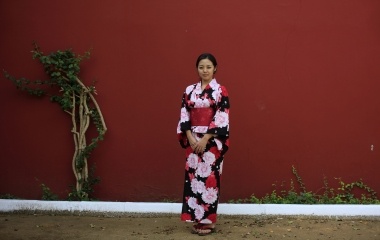 Japanese learner of flamenco song and dance, Maika Kubo, 24, poses in kimono for a portrait near Seville