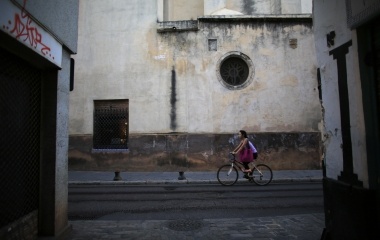 Japanese learner of flamenco song and dance, Maika Kubo, 24, rides a bicycle in the Andalusian capital of Seville