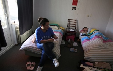 Spanish nurses Maria Jose Marin and her twin sister Maria Teresa take a rest in their apartment of the nursing home in the Hague