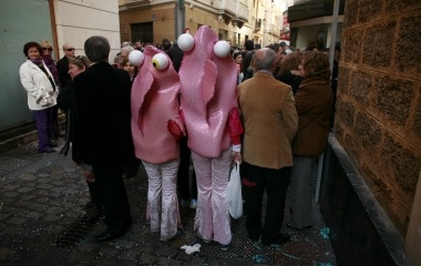 A couple in fancy costumes are seen during the Carnival of Cadiz