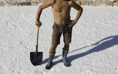 Antonio Dominguez, 40, worker in Iptuci saltworks poses in the white village of Prado del Rey, southern Spain