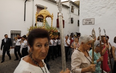 Members of Virgin of los Angeles brotherhood take part during a procession in the white village of Grazalema, southern Spain