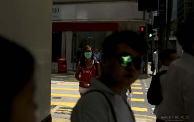 People are seen in the Central district in Hong Kong