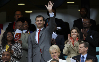 Spanish Crown Prince Felipe waves next to Princess Letizia during the 2010 World Cup Group H match between Spain and Switzerland in Durban