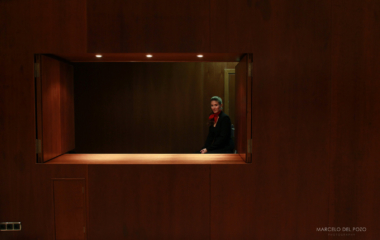 A cloakroom attendant Marta Alaminos sits in a hotel in the Andalusian capital of Seville