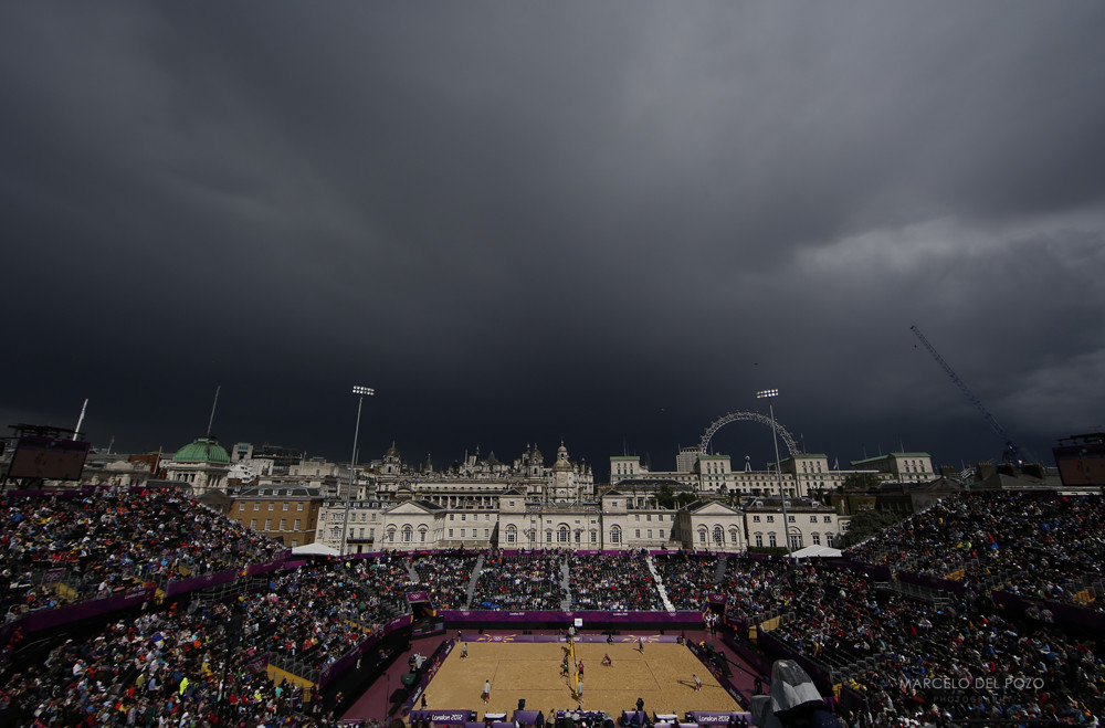 Rain clouds are seen over Horses Guards Parade, where the beach volleyball competition is taking place, at the London 2012 Olympics Games