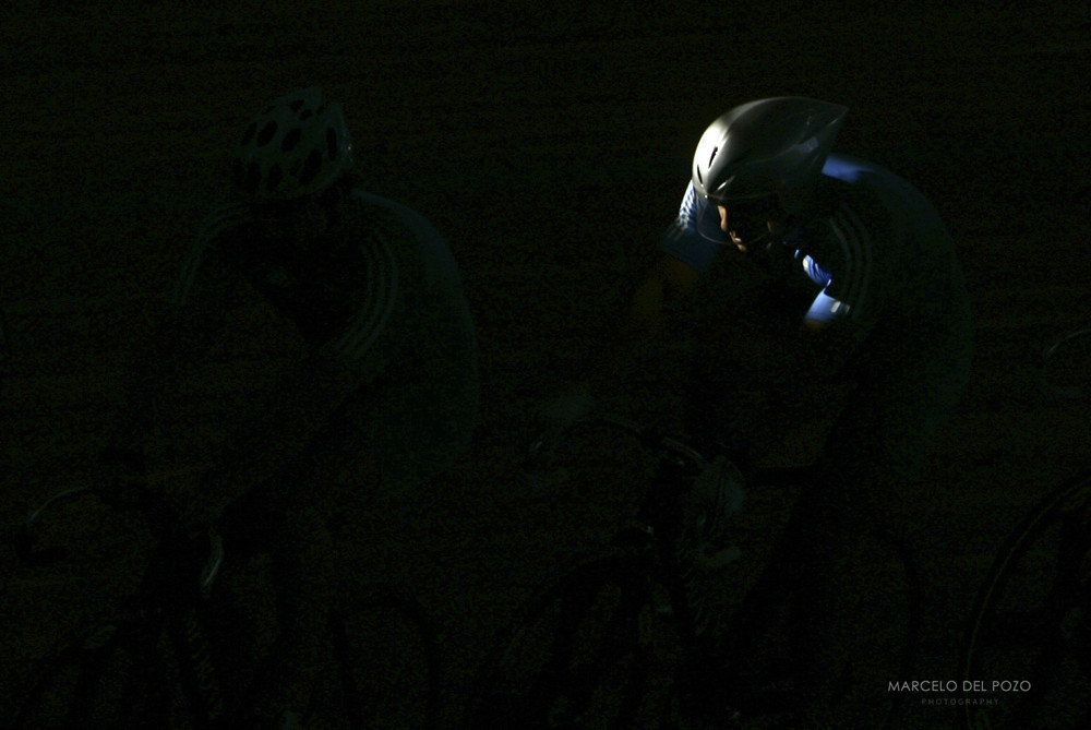 A ray of sunlight shines on the helmet of a Greek cyclist during a free training session in Athens.