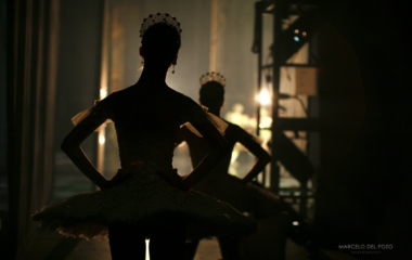 Ballet dancers from the English National Ballet watch backstage the first act of "Cinderella" in Seville